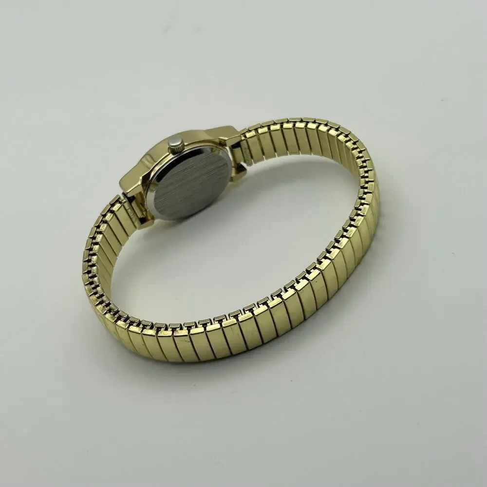 Gold-tone Oval Case Stainless Steel Stretch Band Women’s Watch Working